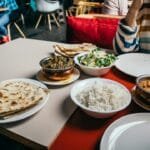 Budget-friendly Indian lentil curry meal with rice and vegetables