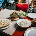 Budget-friendly Indian lentil curry meal with rice and vegetables