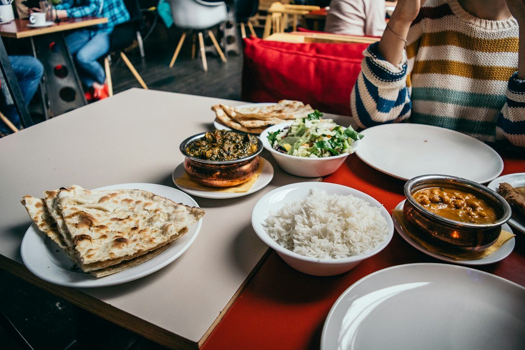 Budget-friendly Indian lentil curry meal with rice and vegetables
