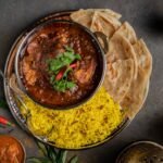 Indian vegetarian festive dinner with naan and curry