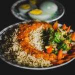 A bowl of lentils and vegetables