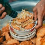 Indian street food chaat with crispy puris and chutneys