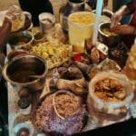 Indian chaat street food with chutneys, onions and crispy puris