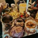 Indian chaat street food with chutneys, onions and crispy puris