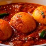 Boiled eggs in a rich Indian onion tomato curry