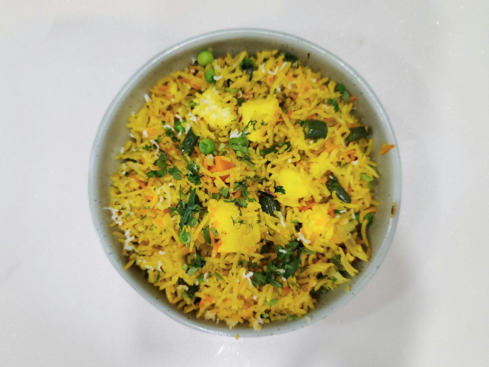 Homemade Indian vegetable pulao with basmati rice and mixed vegetables